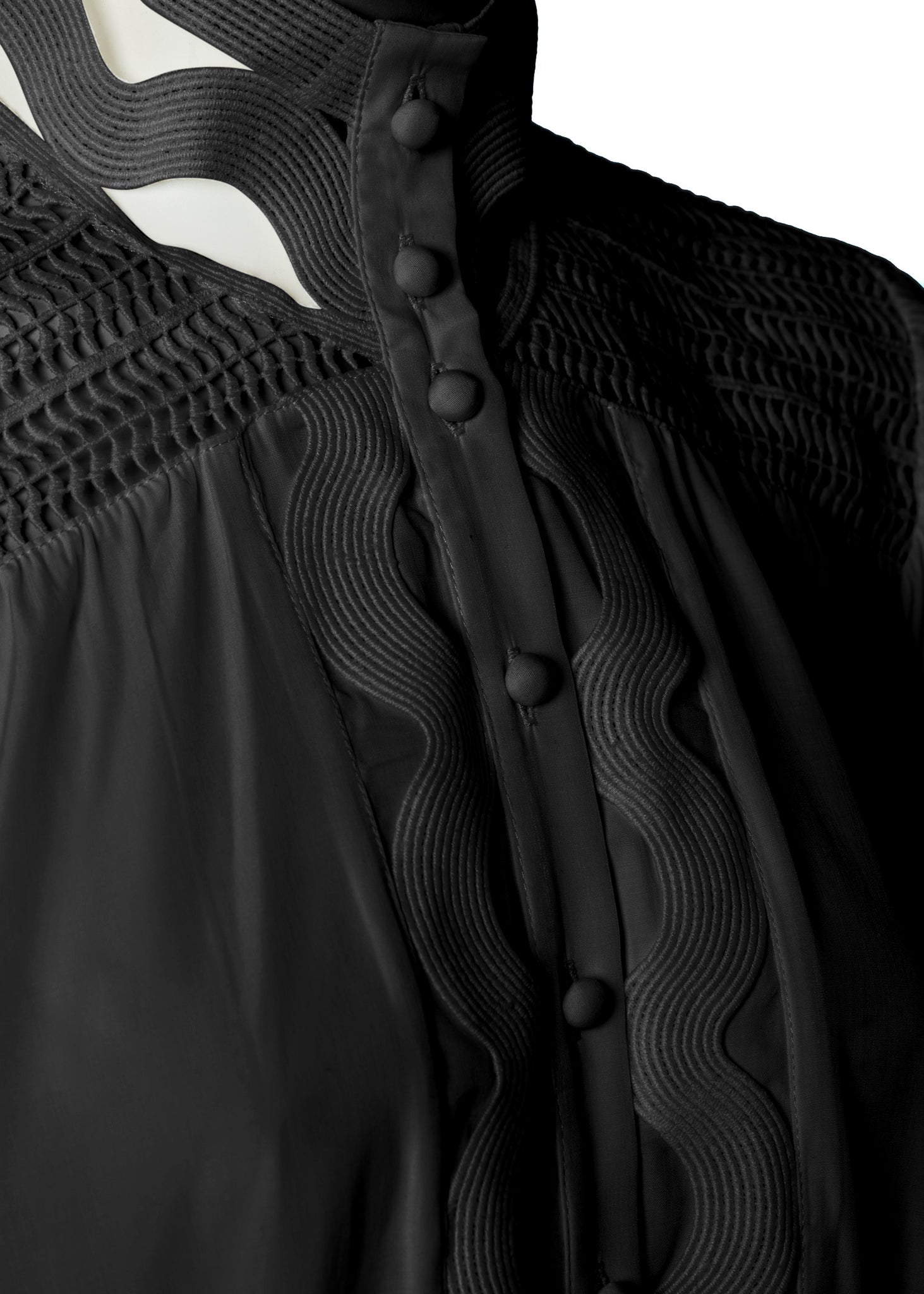 button detail on womens black shirt with lace detail to the collar shoulders and arm cuffs and balloon sleeve