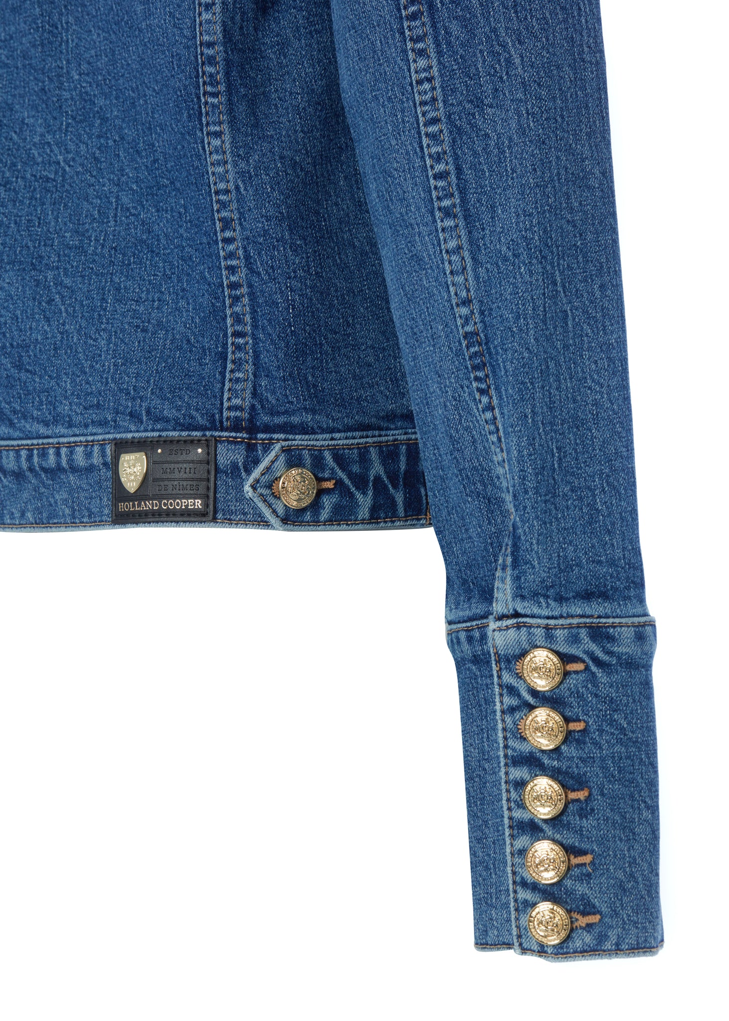 gold button detail on cuffs of classic indigo denim jacket waist length with gold buttons on front, pockets and cuffs with holland cooper embroidery on back