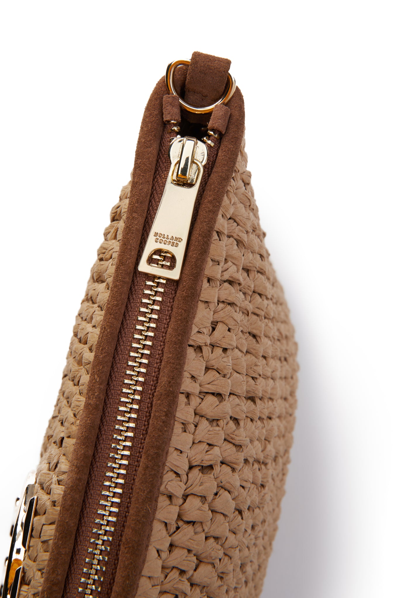 detail shot womens natural raffia bag with gold zip