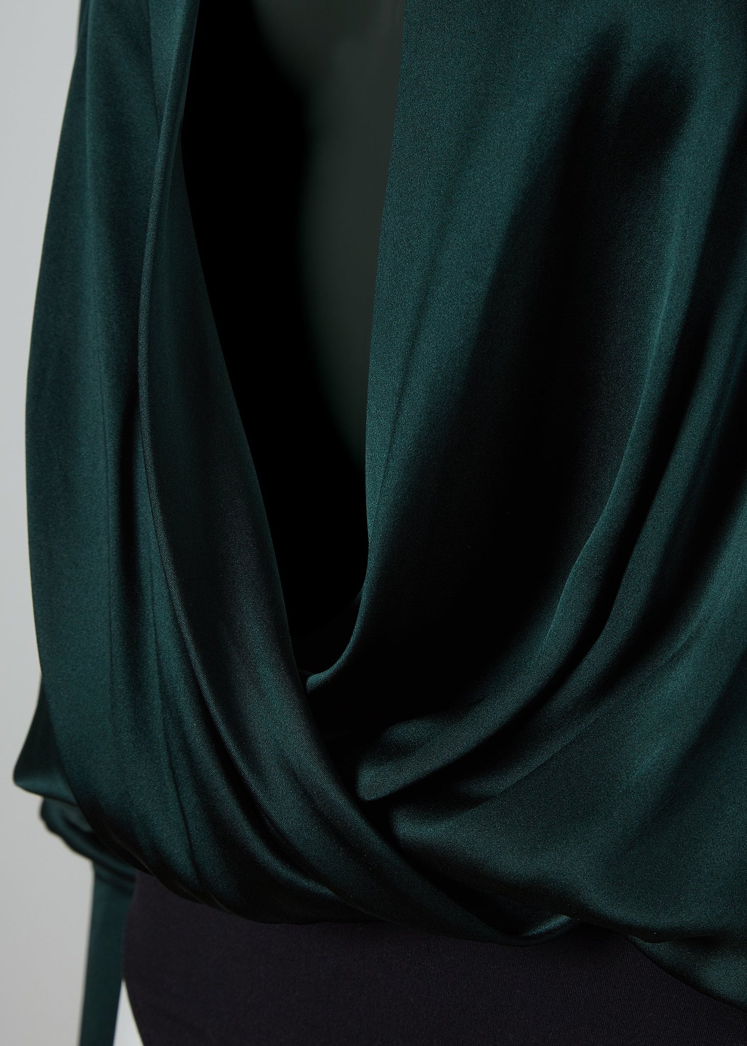 wrap detail on womens long sleeve silk dark green wrap front bodysuit with gold buttons