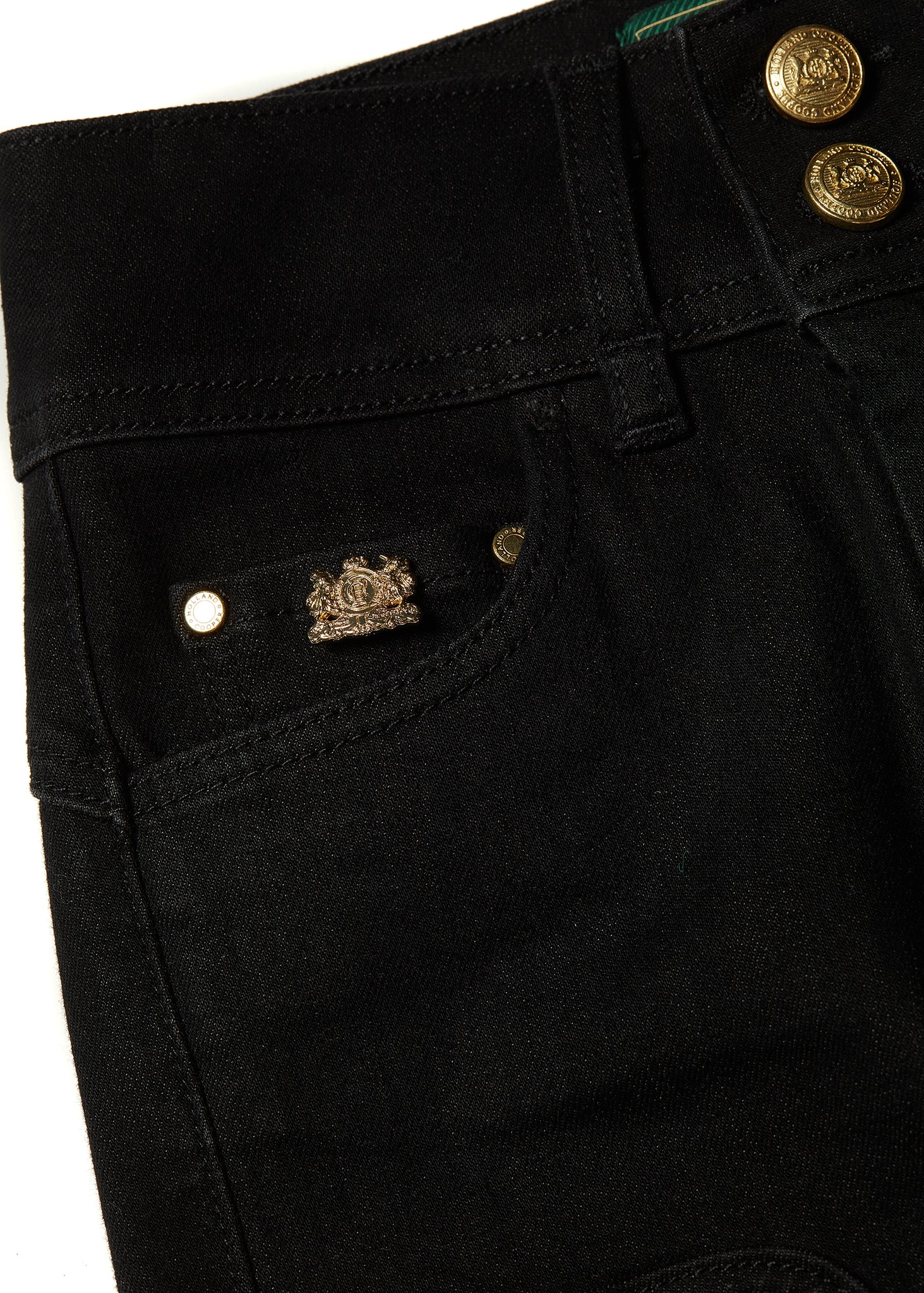hc gold crest detail on front right pocket on womens high rise black denim skinny stretch thermal jean with jodhpur style seams and two open pockets to the front and back with internal fleece lining
