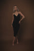 video of womens ribbed black v neck midi dress with silver chain straps 