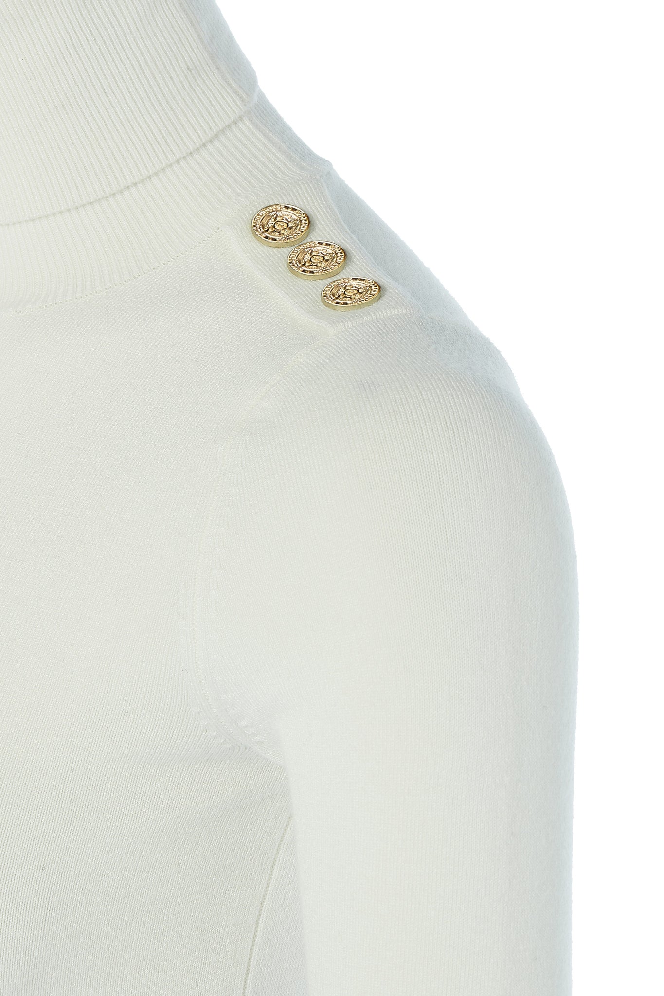 gold button detail across the shoulders of super soft lightweight jumper in cream with ribbed roll neck collar, cuffs and hem