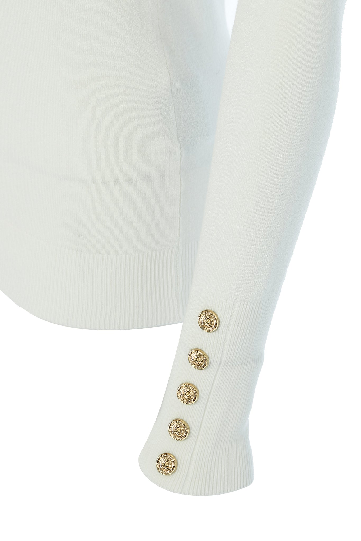 gold button detail on cuffs of super soft lightweight jumper in cream with ribbed roll neck collar, cuffs and hem