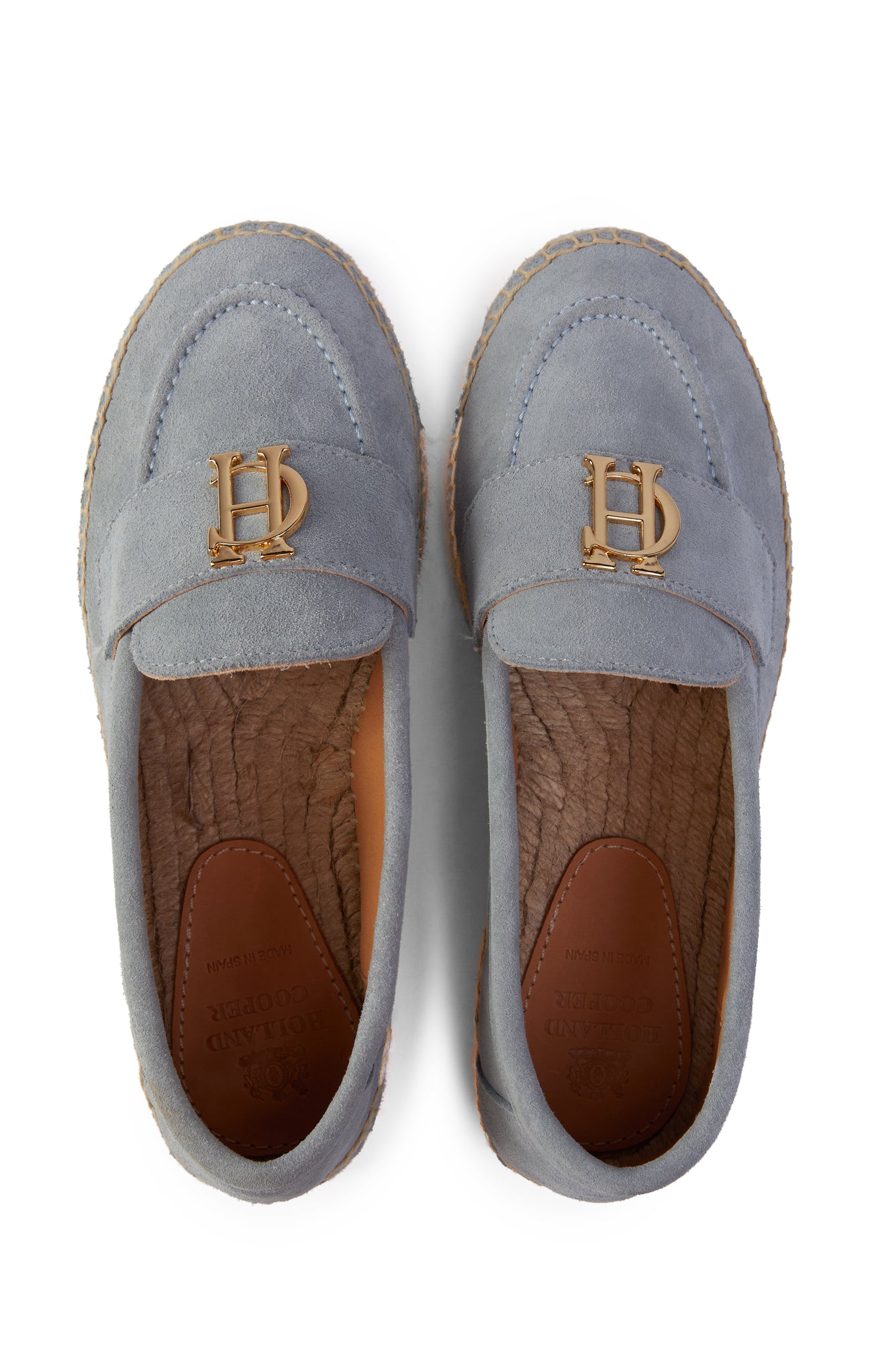 Birds eye view of light blue suede classic espadrille with plaited jute sole and gold hardware on top